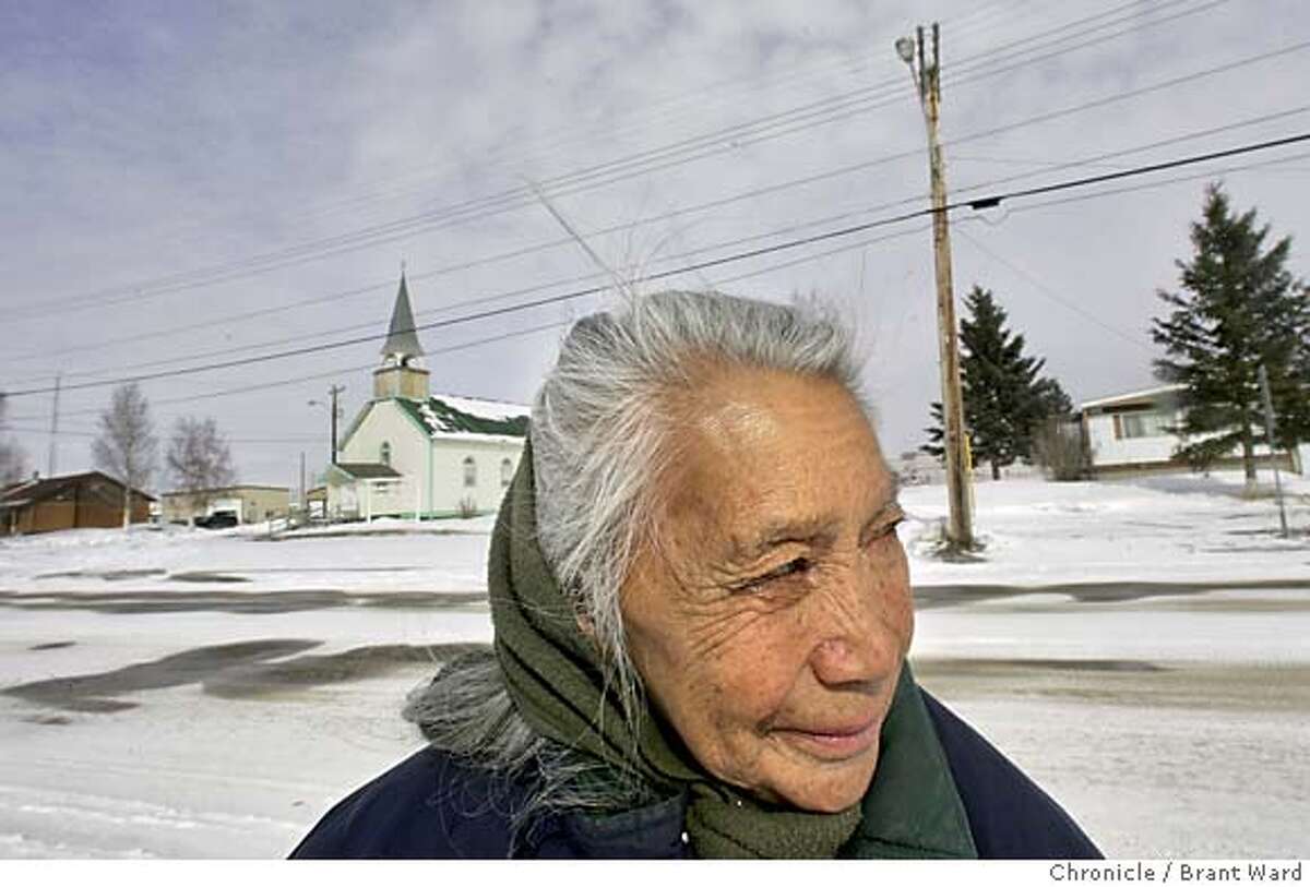 ft_simpson700_ward.jpg Corine Grossetete, 73, has lived here all her life. She stops to talk with her son on the main street in town. The First Nations people of Fort Simpson, Northwest Territories, have stopped the construction of the McKenzie pipeline from going through their lands. The pipeline, if built, would carry valuable natural gas and crude down from the north to an energy starved world. The people of Fort Simpson want a lot of control and payment from the oil companies that no deal has been reached yet. They remember another pipeline that was built through their lands that they never profited from...and they recently met with officials to explain their concerns. This is a portrait of the community. Brant Ward 4/16/05