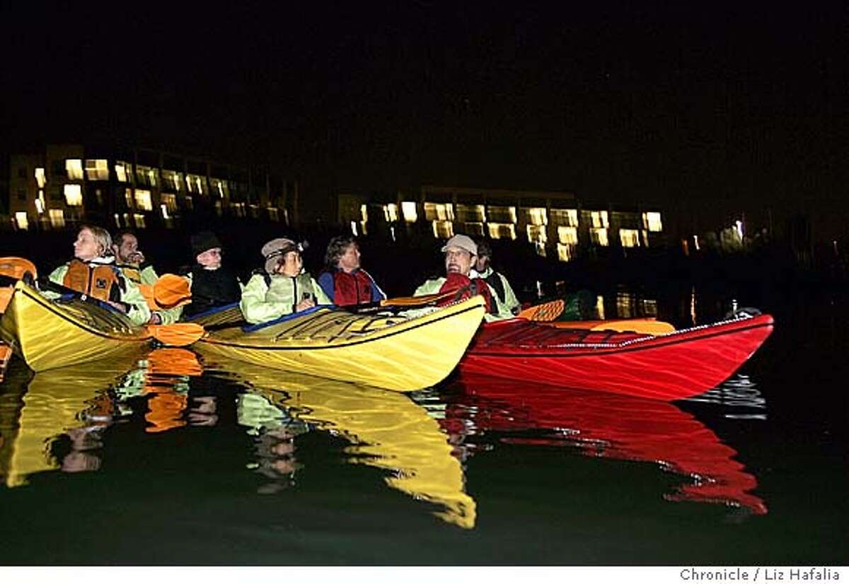 RECREATION / Kayakers see the bay in a different light