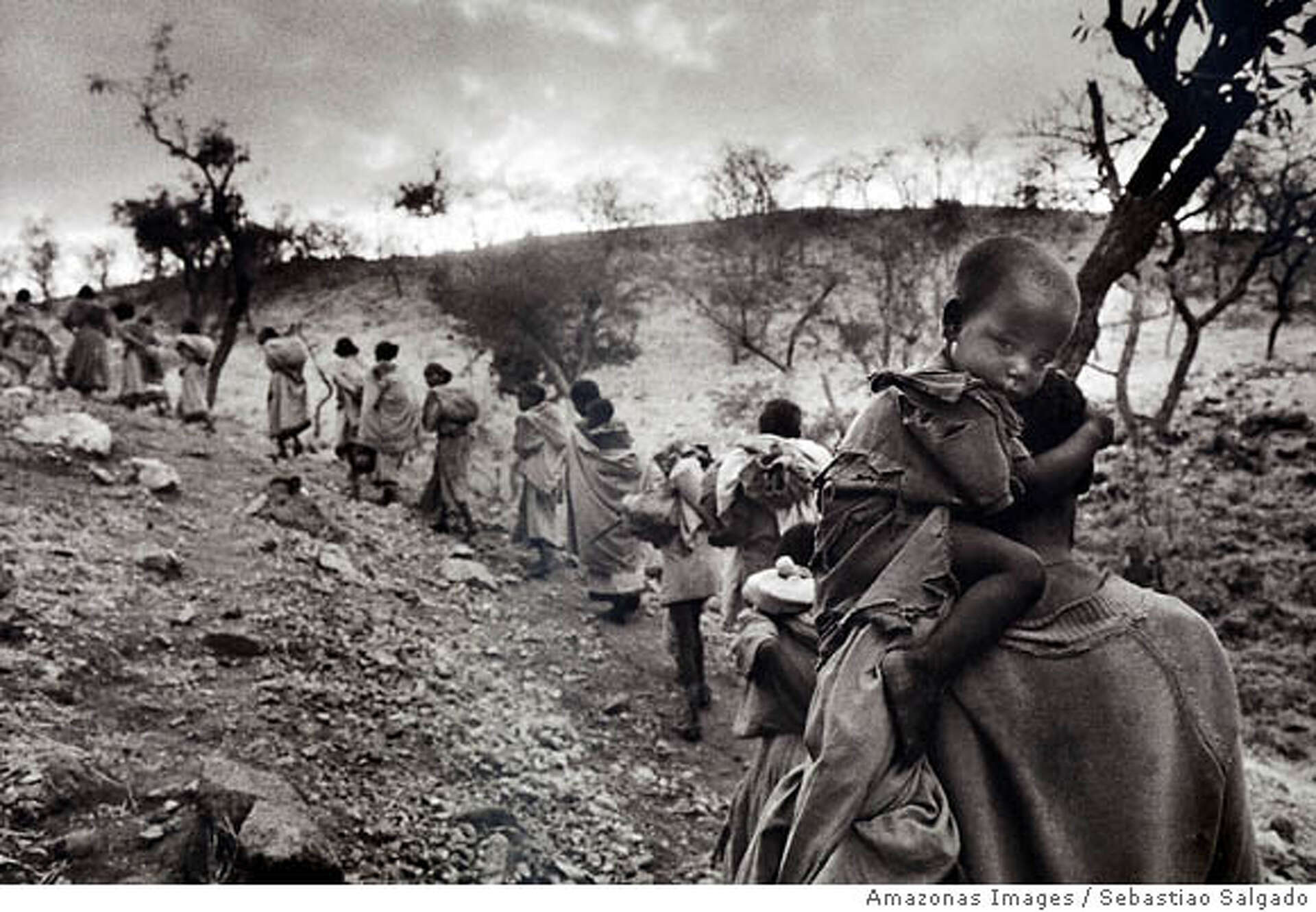 Salgado takes photos of suffering. But he doesn