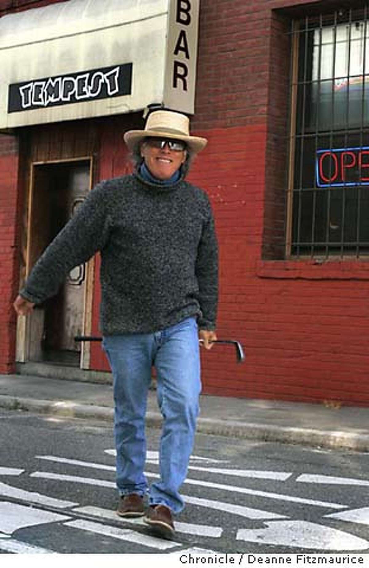cecil08_072_df.JPG Chris Felver practices his golf swing in an alley in San Francisco. He has made a documentary film called Cecil Taylor: all the Notes.. Deanne Fitzmaurice/The Chronicle