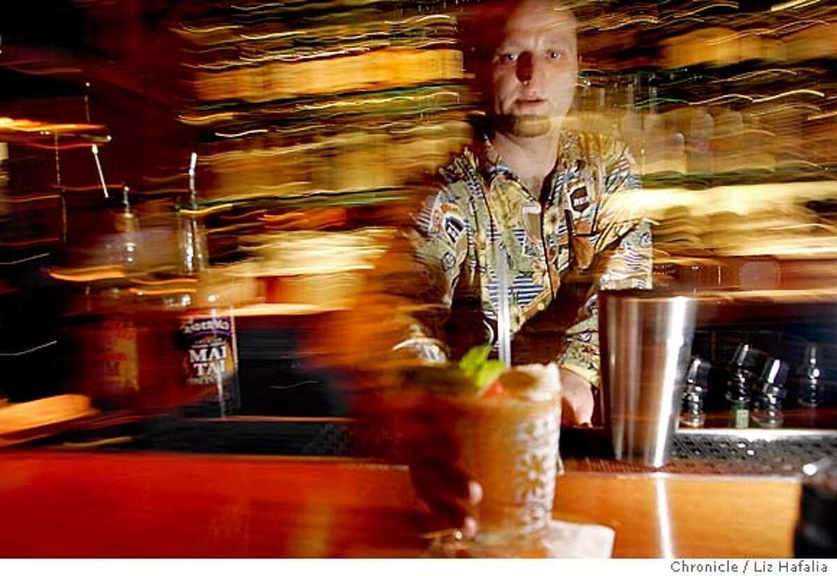 Illustrating a story on the history of the mai tai cocktail, assitant bar manager of Trader Vic's restaurant, Jim Shoemake, makes a mai tai. Photo taken in San Francisco on 11/4/04, CA. by LIZ HAFALIA / San Francisco Chronicle