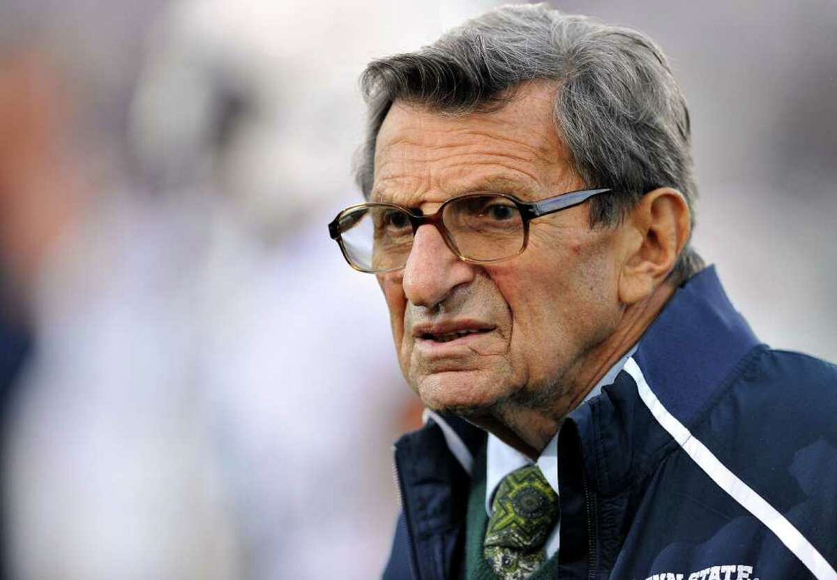 FILE - In this Oct. 22, 2011 file photo, Penn State coach Joe Paterno stands on the field before his team's NCAA college football game against Northwestern, in Evanston, Ill. Paterno's doctors say that the former Penn State coach's condition has become "serious," following complications from lung cancer in recent days. (AP Photo/Jim Prisching, File)
