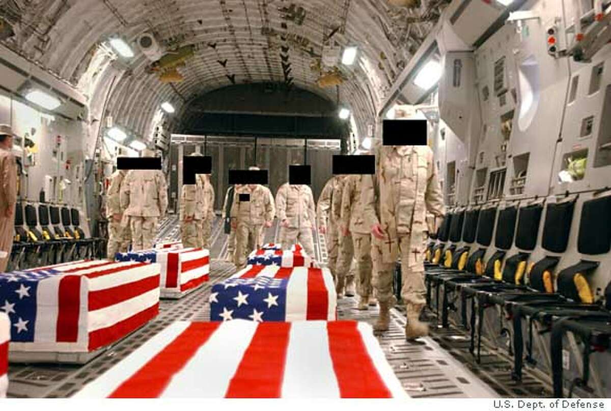 UNDATED: Caskets bearing the remains of U.S. servicemen are shown in the cargo hold of a transport plane in this undated handout photo released April 28, 2005 by the Pentagon. The release this week of more than 700 images showing the return of American casualties to Dover Air Force Base and other U.S. military facilities follows Freedom of Information Act requests and a lawsuit charging the Pentagon with failing to comply with the act. The military digitally concealed faces and other identifying marks. (Photo by U.S. Department of Defense/The National Security Archive via Getty Images) Ran on: 04-29-2005 This undated photo released by the Pentagon shows a transport plane carrying caskets with the remains of U.S. soldiers killed in Iraq. Ran on: 04-29-2005 This undated photo released by the Pentagon shows a transport plane carrying caskets with the remains of U.S. soldiers killed in Iraq.