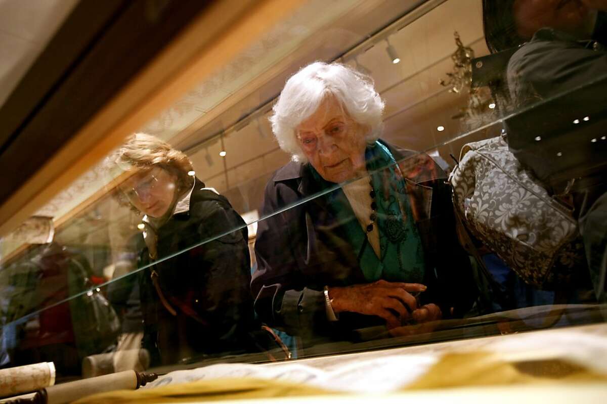 Esther Levy, of Albany, takes in the displays at the re-opening of Magnes Museum in Berkeley, Calif., Sunday, January 22, 2012.