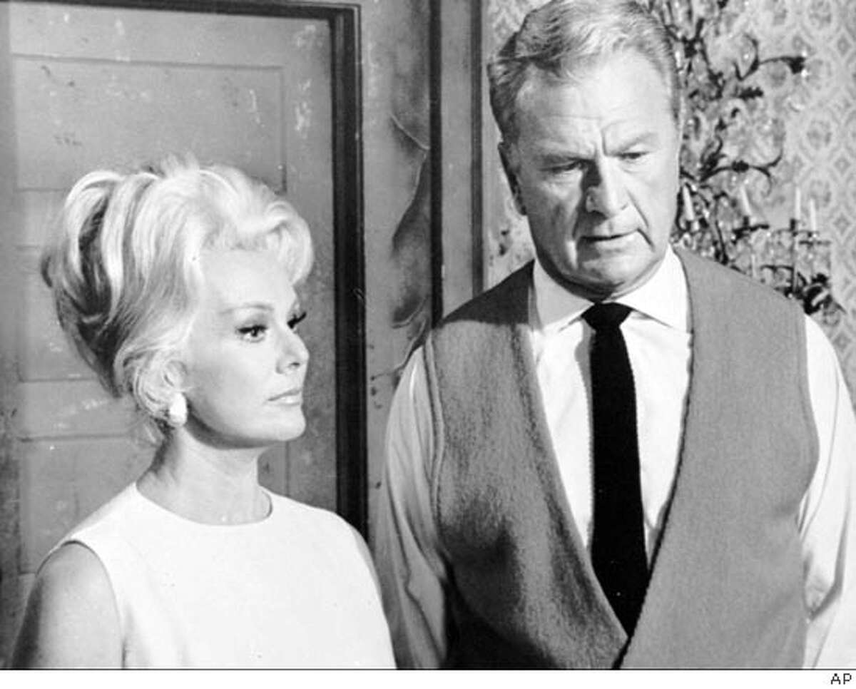 FILE--In a scene from an episode of CBS-TV's "Green Acres", Eva Gabor and Eddie Albert are shown in this Sept. 8, 1967 file photo. Eva Gabor died Tuesday, July 4, 1995 at Cedars-Sinai Medical Center in Los Angeles from respiratory distress and other infections, hospital spokesman Ron Wise said. She was 74. (AP Photo) THIS IS A SEPT. 8, 1967 FILE PHOTO B&W ONLY