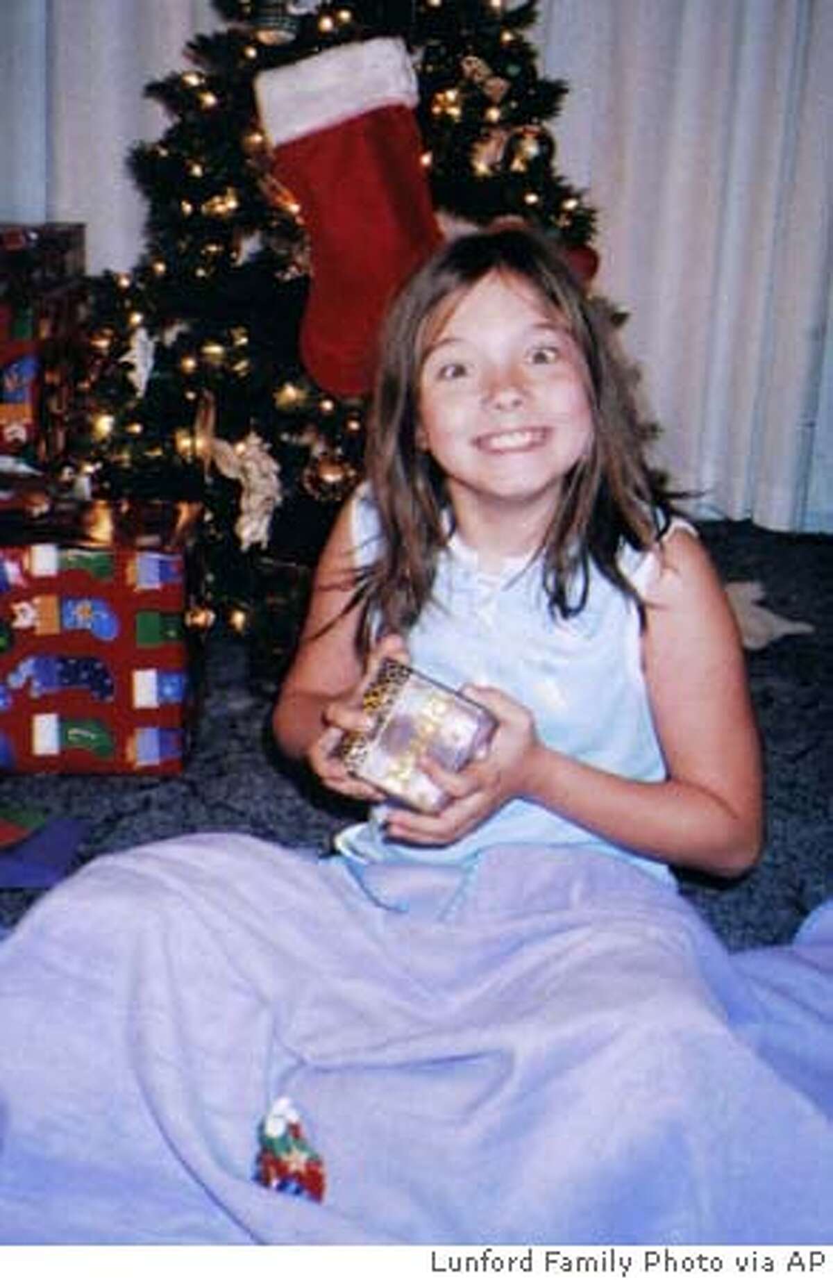 Jessica Lunsford, shown in this Dec. 25, 2004 photo released by the Lunsford Family. John Evander Couey, a registered sex offender, has admitted kidnapping Lunsford, a 9-year-old Florida girl from her bedroom last month and killing her, authorities said Friday, March 18, 2005. (AP Photo/Lunford Family Photo) Ran on: 03-19-2005 John Evander Couey