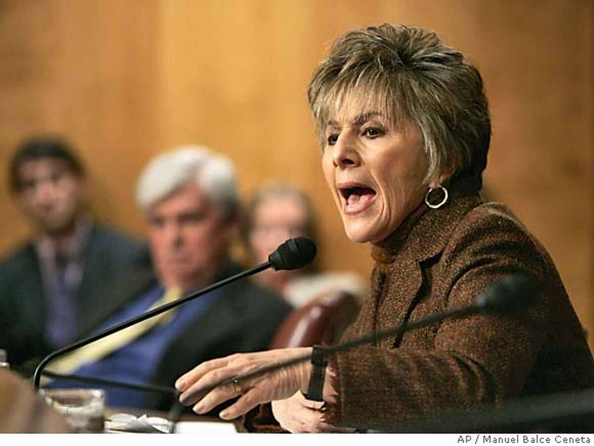 Sen. Barbara Boxer, D-Calif., makes a comment to former assistant Secretary of State for Intelligence and Research Carl W. Ford Jr., (not in picture) as he testifies before the Senate Foreign Relations Committee on the nomination of John Bolton as ambassador to the U.N on Capitol Hill, Tuesday, April 12, 2005. Ford, a former chief of the State Department's bureau of intelligence and research castigated Bolton on Tuesday as a 'kiss-up, kick-down sort of guy' who abused analysts who disagreed with his views of Cuba's weapons capabilities. Seated in back center is Sen. Christopher Dodd, D-Conn. (AP Photo/Manuel Balce Ceneta) Ran on: 04-19-2005 Boxer