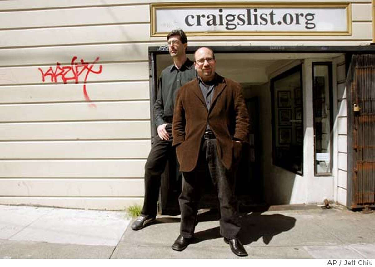 Craigslist.org CEO Jim Buckmaster, left, and founder Craig Newmark are photographed outside of their office in San Francisco on Thursday, April 14, 2005. Newspaper publishers find themselves in a confounding position as readers continue to defect to the Internet. San Francisco-based craigslist.org is one of the many Web sites that have newspaper publishers fretting. (AP Photo/Jeff Chiu) ATTENTION RICH KARECKAS