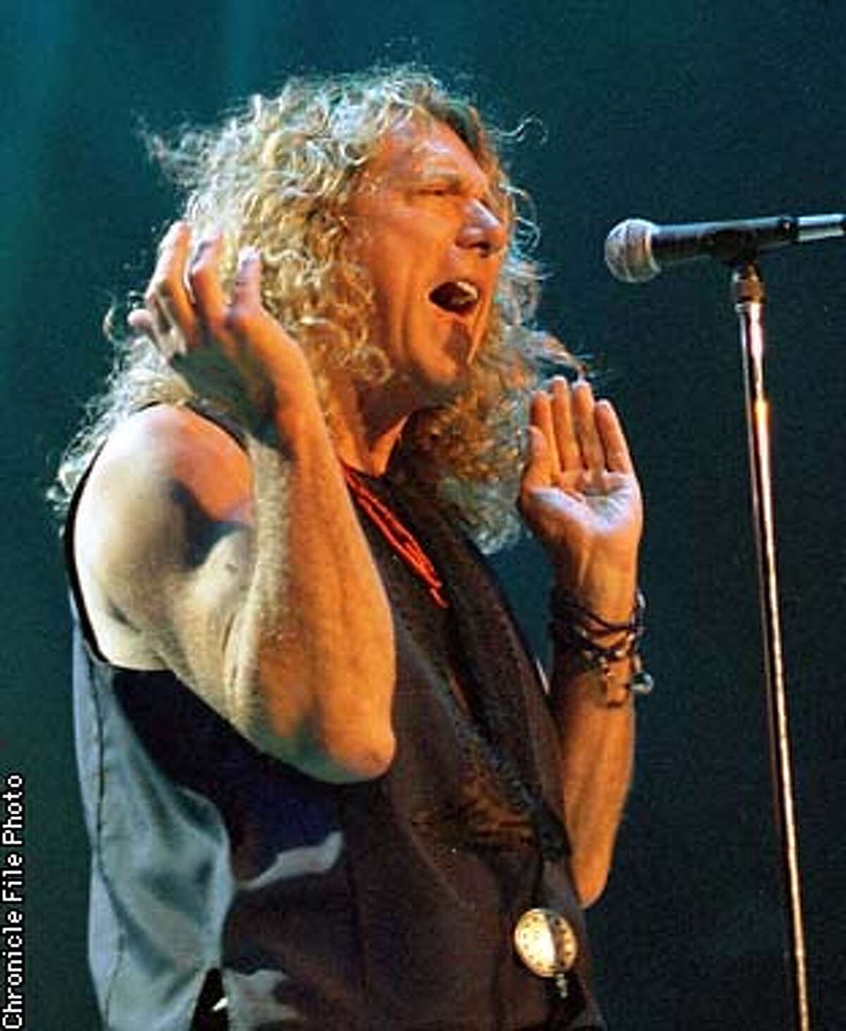 Former vocalist of Led Zeppelin Robert Plant during his concert with guitarist Jimmy Page at the OAkland Coliseum, Friday May19,1995. Chronicle Photo By: Peter DaSilva