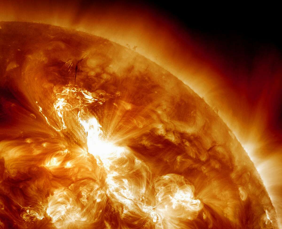 This handout image provided by NASA, taken Sunday night, Jan. 22, 2012, shows a solar flare erupting on the Sun's northeastern hemisphere. Space weather officials say the strongest solar storm in more than six years is already bombarding Earth with radiation with more to come. The Space Weather Prediction Center in Colorado observed a flare Sunday night at 11 p.m. EST. Physicist Doug Biesecker said the biggest concern from the speedy eruption is the radiation, which arrived on Earth an hour later. It will likely continue through Wednesday. It's mostly an issue for astronauts' health and satellite disruptions. It can cause communication problems for airplanes that go over the poles. (AP Photo/NASA)
