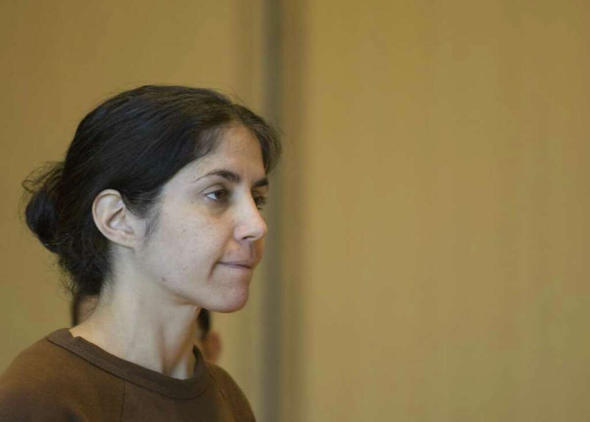 Sheila Davalloo at her arraignment for the murder of Anna Lisa Raymundo at Superior Court at Stamford in Stamford on Tuesday, Dec. 30, 2008. A decade after Raymundo was killed, Davalloo will represent herself against a murder charge in a trial that begins Tuesday, Jan. 24, 2012 at state Superior Court in Stamford. Authorities say Davalloo killed Raymundo to eliminate her rival in a love-triangle involving a male co-worker at Purdue Pharma in Stamford. Chris Preovolos/Staff file photo