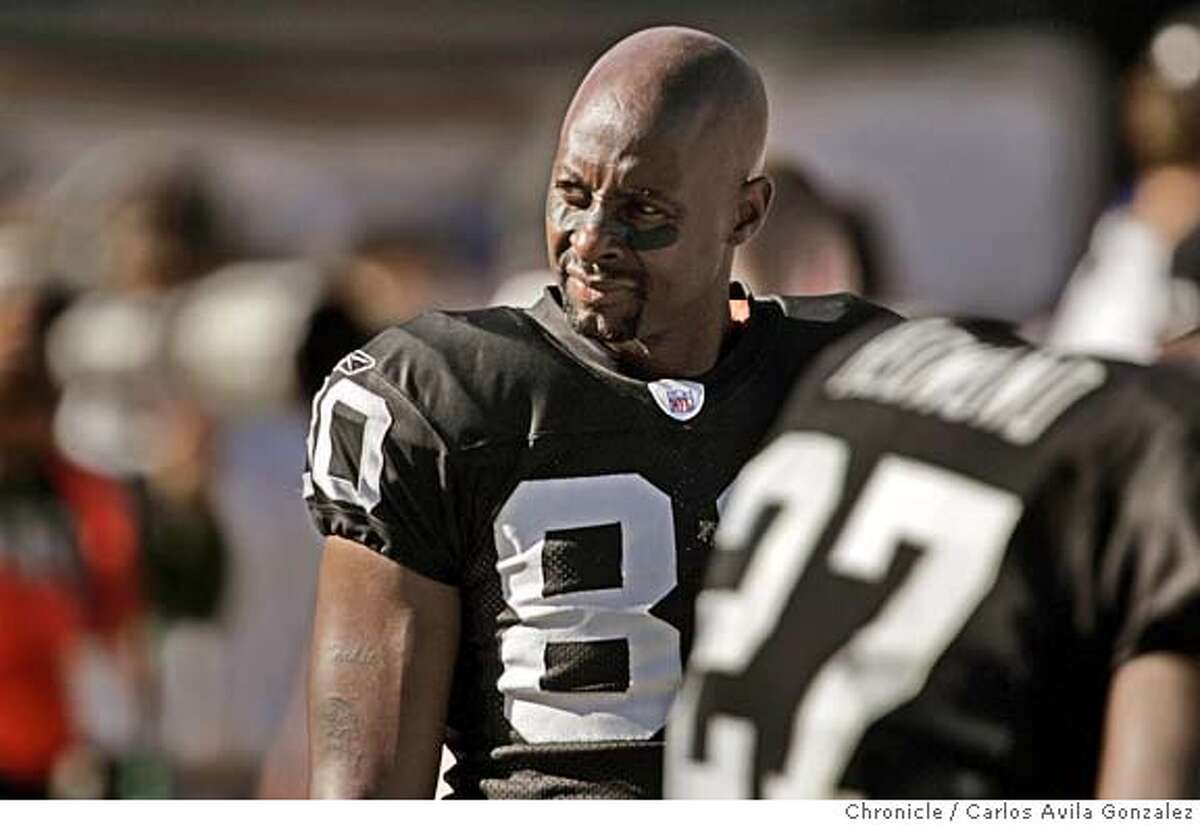 Former San Francisco 49ers wide receiver Jerry Rice stands on the