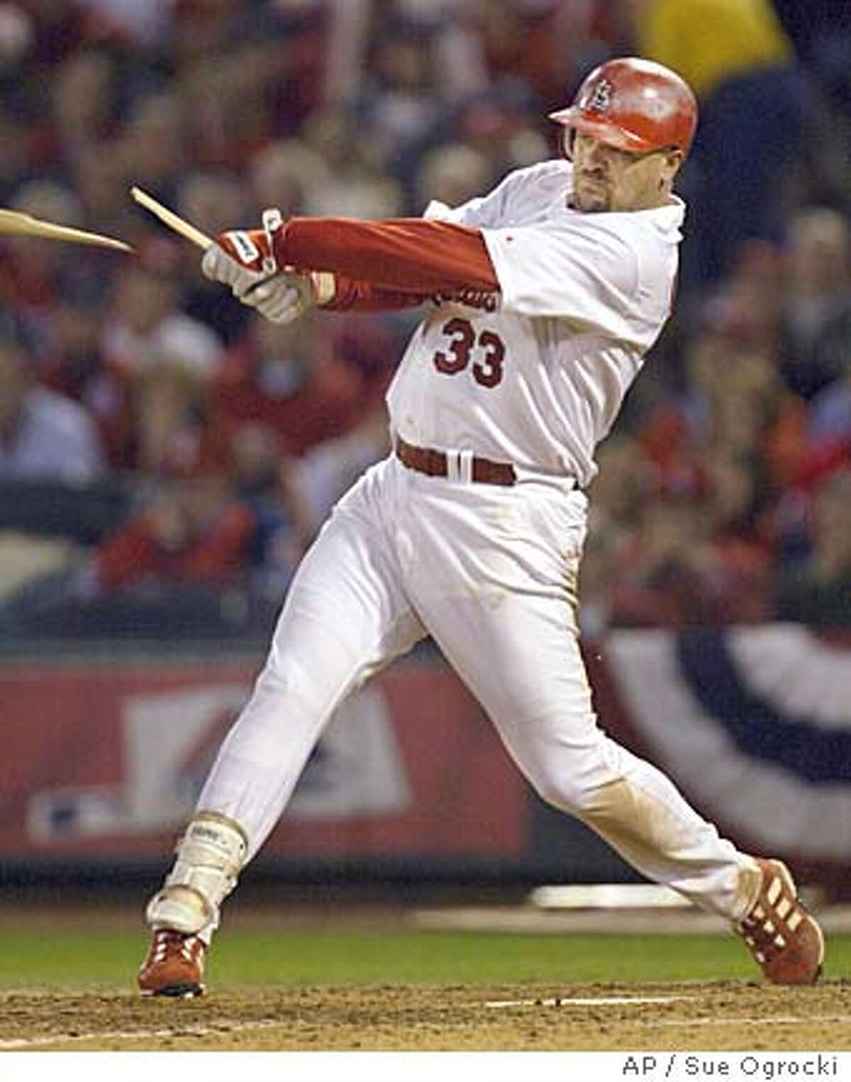 St. Louis Cardinals' Larry Walker breaks his bat as he hits a double during the fifth inning against the Houston Astros during Game 1 of the National League Championship Series at Busch Stadium in St. Louis, Wednesday, Oct. 13, 2004. (AP Photo/Sue Ogrocki) Sports#Sports#Chronicle#10/14/2004#ALL#5star##0422411898