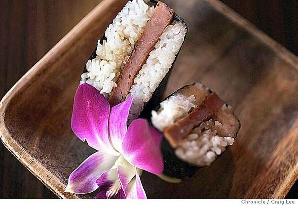 HAWAII29_058_cl.jpg Photo of one of their tradtional Hawaiian dishes, Spam Musubi, which is pan fried spam, with rice, wrapped in seaweed. Story roundup on Hawaiian restaurants in the Bay Area. Photo of Hukilau restaurant at 5 Masonic at Geary Blvd. Event on 9/17/04 in San Francisco. Craig Lee / The Chronicle MANDATORY CREDIT FOR PHOTOG AND SF CHRONICLE/ -MAGS OUT Food#Food#Chronicle#10/13/2004##Advance##0422353523