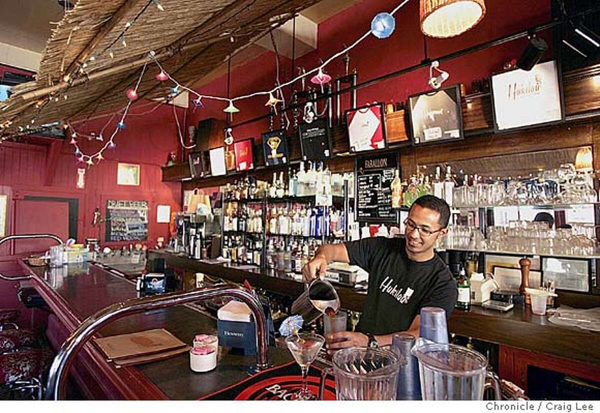 HAWAII29_043_cl.jpg Photo of Jon Meneses, bartender at Hukilau. Story roundup on Hawaiian restaurants in the Bay Area. Photo of Hukilau restaurant at 5 Masonic at Geary Blvd. Event on 9/17/04 in San Francisco. Craig Lee / The Chronicle MANDATORY CREDIT FOR PHOTOG AND SF CHRONICLE/ -MAGS OUT Food#Food#Chronicle#10/13/2004##Advance##0422353506