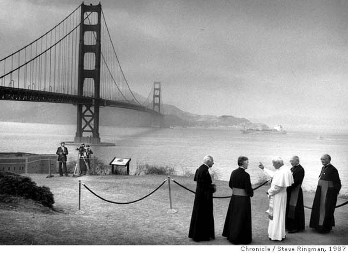 ** FILE ** Pope John Paul II with Archbishop John Quinn to his left and other unidentified Cardinals are seen at the Golden Gate Bridge in San Francisco, Sept. 18, 1987. (AP Photo/San Francisco Chronicle, Steve Ringman)