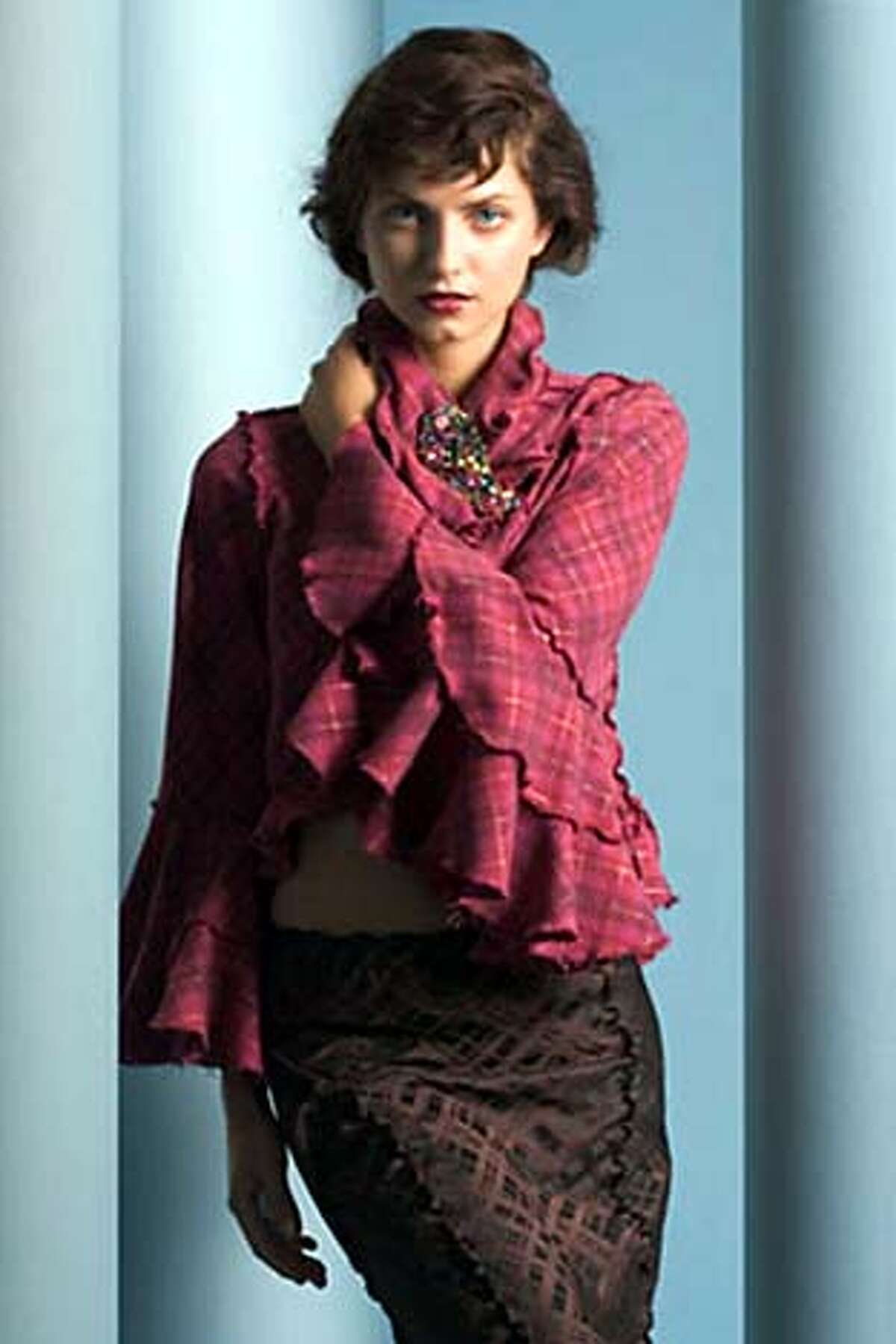 Cari Borja, jacket and skirt GenArt S.F. Fall 2004 winner HANDOUT Living#Living#Chronicle#10/10/2004#ALL#Advance#FX#0422396732