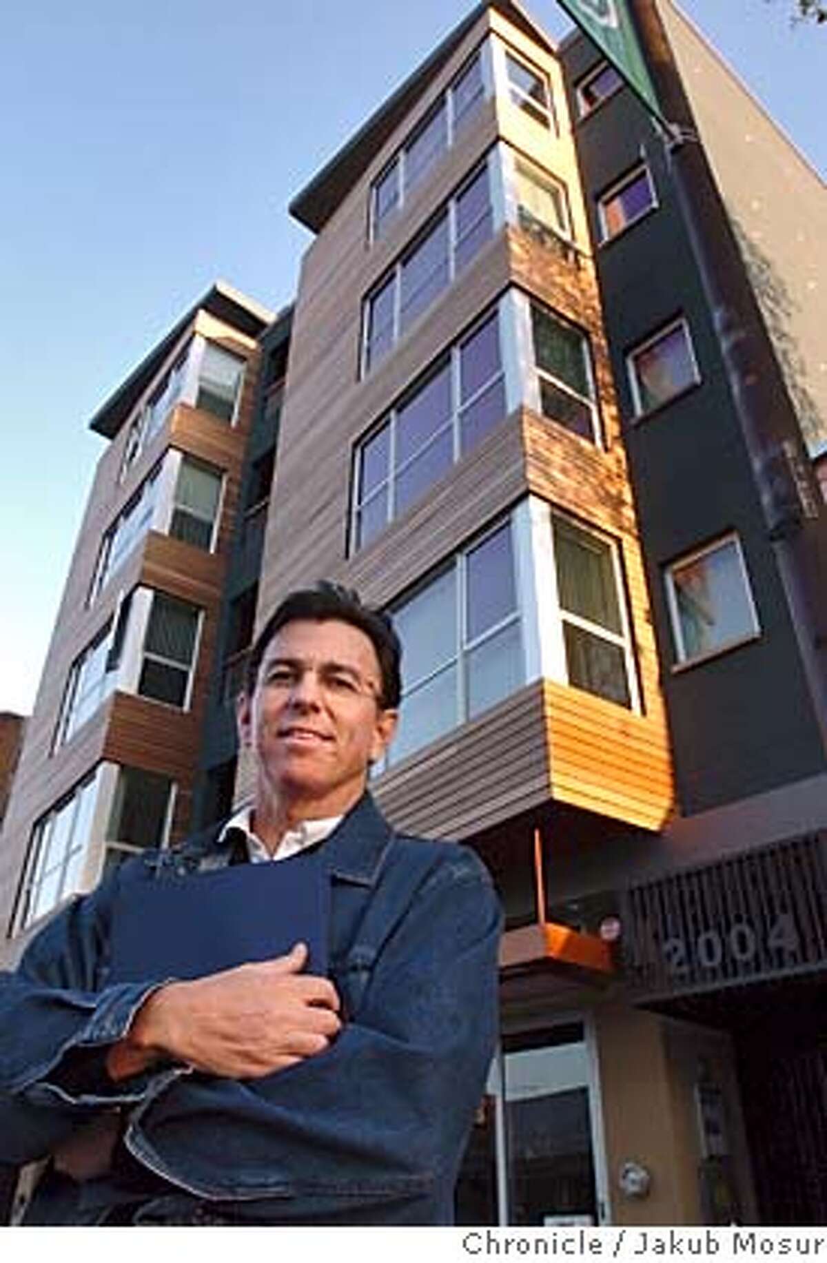 Kennedyxx_03.JPG Berkeley Developer Patrick Kennedy stands in front of the Touriel Building while giving a tour of his three new buildings in downtown Berkeley on Friday, October 1, 2004. JAKUB MOSUR / The Chronicle MANDATORY CREDIT FOR PHOTOG AND SF CHRONICLE/ -MAGS OUT Metro#Metro#Chronicle#10/5/2004#ALL#5star##0422390826