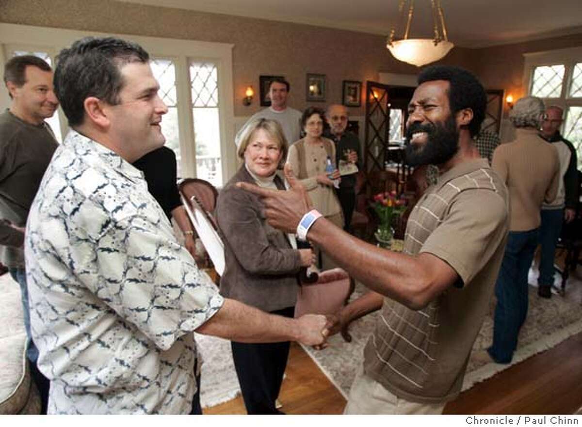 mccullough20_004_pc.jpg Patrick McCullough shook hands with Oakland police Lt. Lawrence Green, who McCullough didn't recognize out of uniform. Green has been assisting McCullough in his battle against drug dealers. In a show of support, Oakland residents held a reception to pay tribute to Patrick McCullough, the North Oakland man who's taken on neighborhood drug dealers on 3/19/05 in Oakland, CA. PAUL CHINN/The Chronicle MANDATORY CREDIT FOR PHOTOG AND S.F. CHRONICLE/ - MAGS OUT