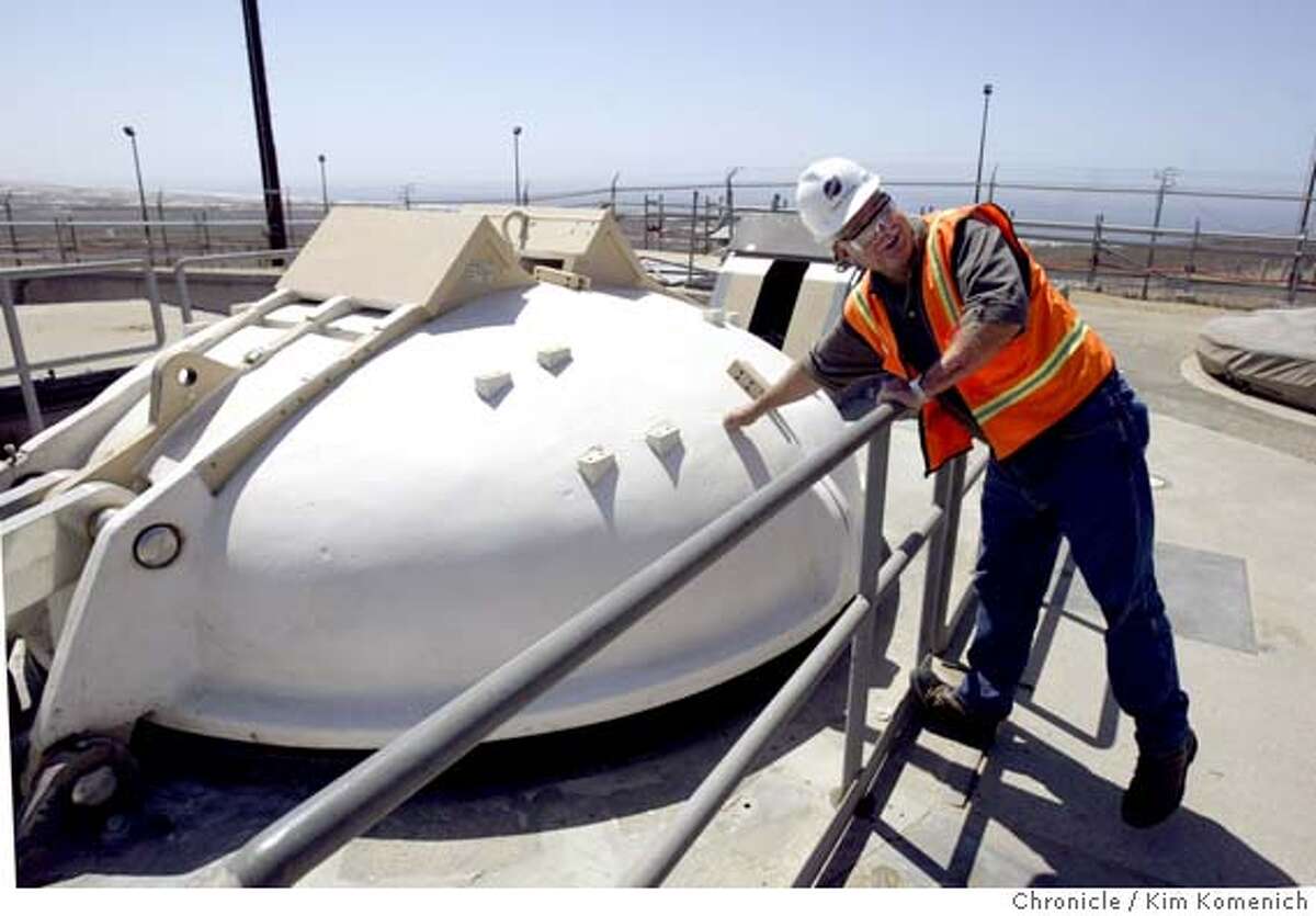 Bechtel Site Manager David Schlick taps the retractible cap of the silo at Launch Site 23. an Francisco's Bechtel Corporation is upgrading the silos at Vandenberg Air Force Base (near Lompoc in Southern California and another base in Alaska where the United States Missile Defense Agency's Groundbased Midcourse Defense program is taking place. When finished, the system will be capable of destroying incoming long-range over the Pacific Ocean before the reach the U.S. mainland.