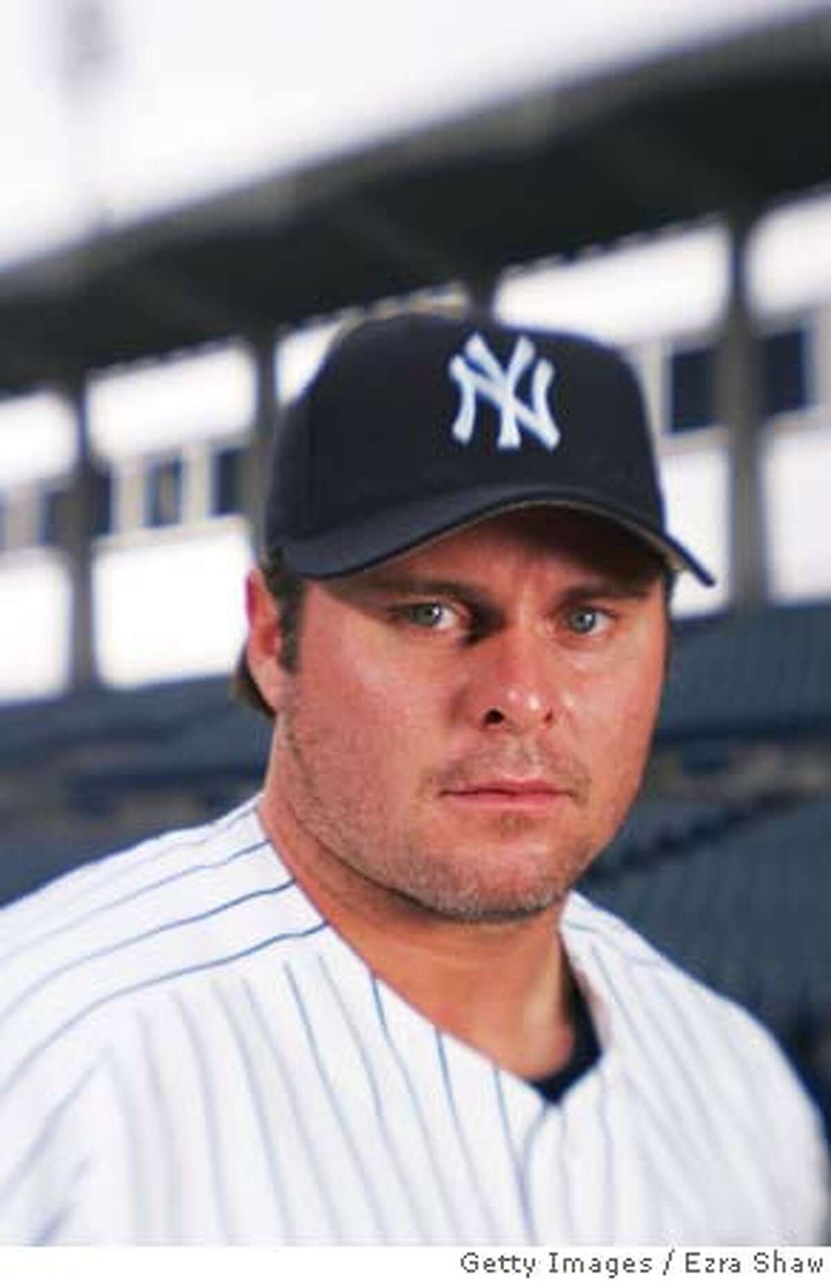 TAMPA, FL - FEBRUARY 25: Jason Giambi #25 of the New York Yankees poses for a portrait during Yankees Photo Day at Legends Field on February 25, 2005 in Tampa, Florida. (Photo by Ezra Shaw/Getty Images) *** Local Caption *** Jason Giambi