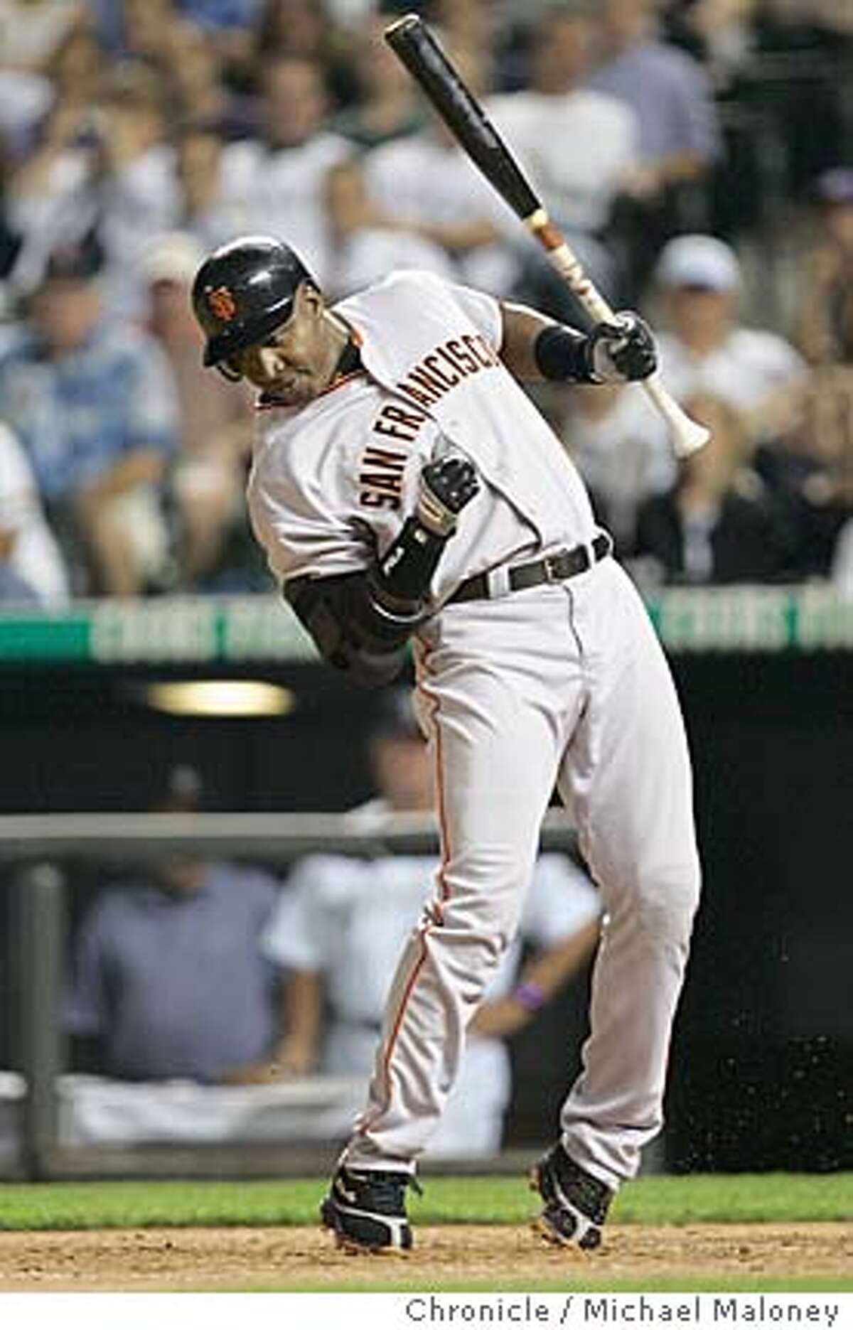 San Francisco Giants Barry Bonds, #25, reacts after getting hit by
