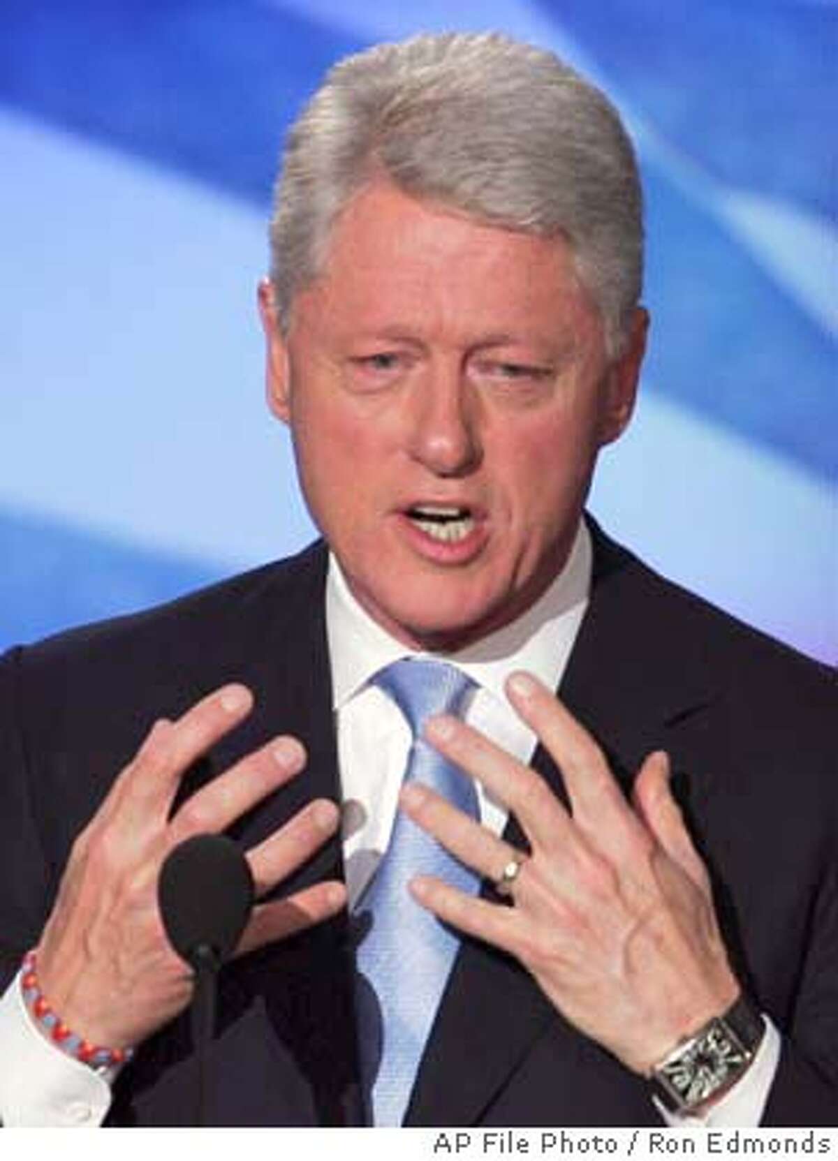 **FILE**Former President Bill Clinton speaks to delegates at the Democratic National Convention in this July 26, 2004 file photo, in Boston.Clinton had a successful quadruple heart bypass operation Monday, Sept. 6, 2004 to relieve clogged arteries, three days after checking himself into the hospital complaining of chest pain and shortness of breath " He is recovering normally at this point," said Dr. Craig R. Smith, the surgeon who led the four-hour operation. "I think right now everything looks straightforward." (AP Photo/Ron Edmonds) #######0422330058