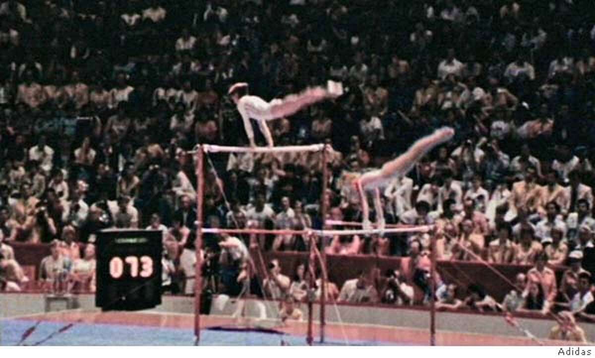 13-year old gymnast Nastia Liukin follows in the path of legendary Nadia Comaneci, the first gymnast ever to score a perfect "10" in targeting the Athens 2004 Olympic Games. The filming of the three spots, also including Jesse Owens and Haile Gebrselassie, involved massive technical challenges as advanced compositing techniques were used to blend old and new film, seamlessly into one. (PRNewsFoto)