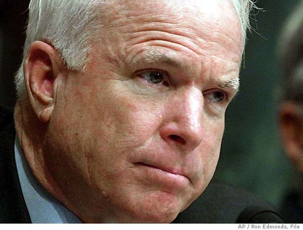 **FILE** Sen. John McCain, R-Ariz. is shown in this May 11, 2004, file photo, in Washington. McCain, a former prisoner of war in Vietnam, called an ad criticizing John Kerry's military service "dishonest and dishonorable" and urged the White House on Thursday, Aug. 5, 2004, to condemn it as well. (AP Photo/Ron Edmonds, File)