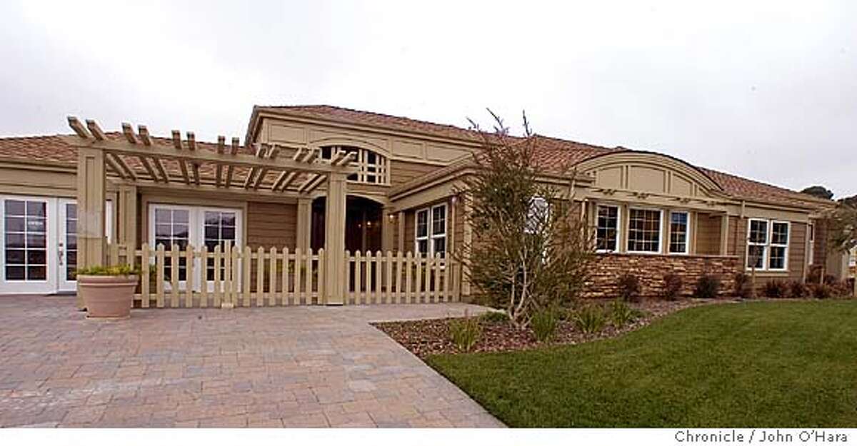 MODEL HOME / Chapel Cove / Courting in San Rafael / Highend development uses central courtyard