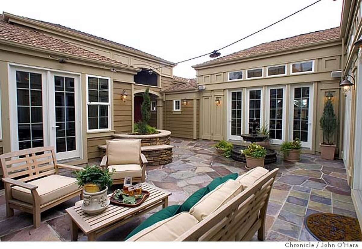 MODEL HOME / Chapel Cove / Courting in San Rafael / Highend development uses central courtyard