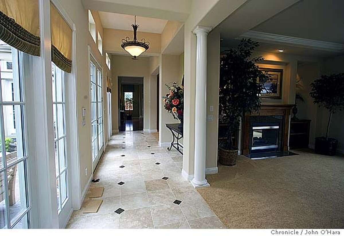 MODEL HOME / Chapel Cove / Courting in San Rafael / Highend development uses central courtyard