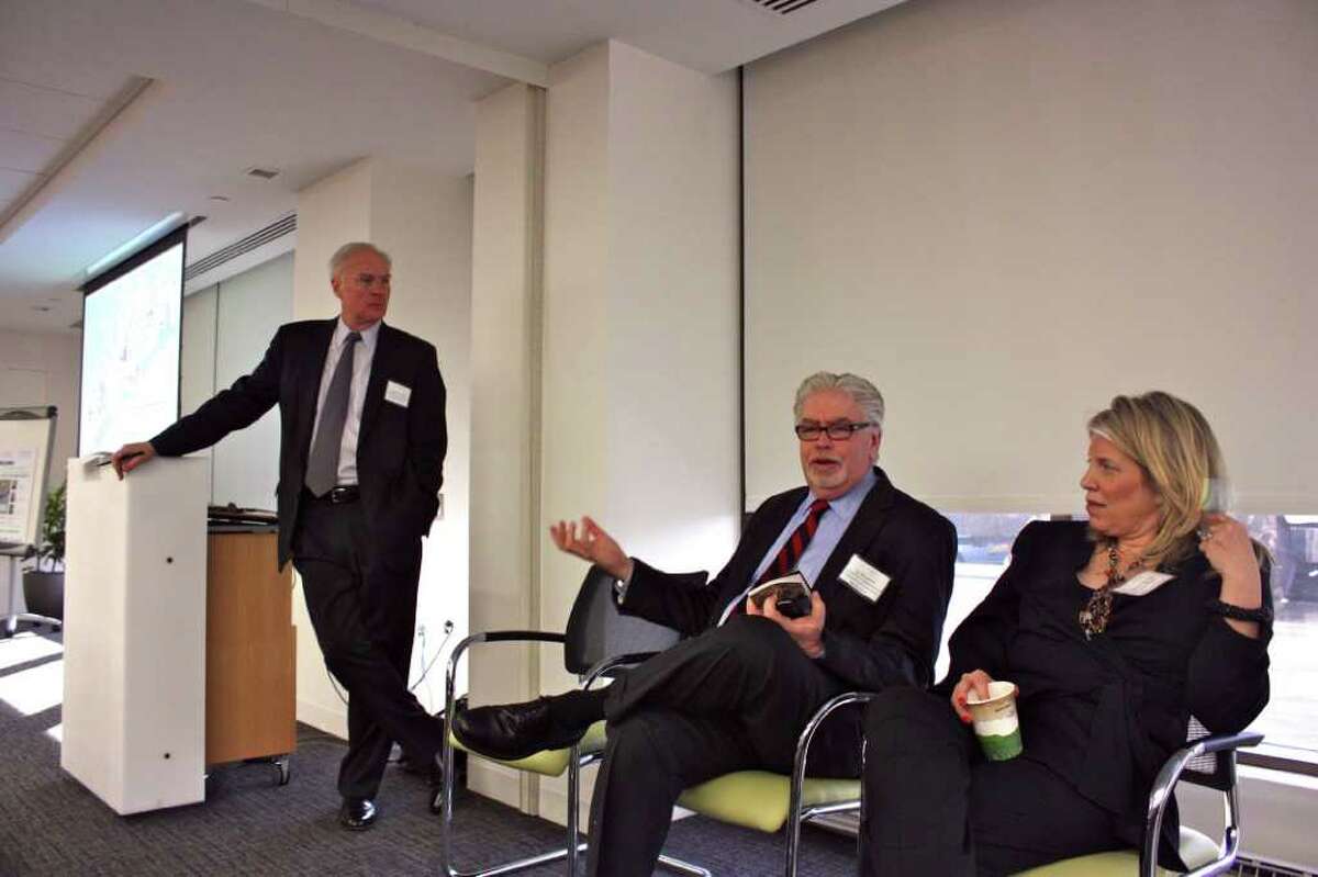 Kip Bergstrom, center, deputy commissioner of the state Department of Economic and Community Development, makes a point at the initial Fairfield County Creative Corridor session. Joining him in the presentation were Christopher Bruhl, left, and Marian Salzman, chief executive officer of Euro RSCG Worldwide PR, North America, and chairwoman of the Fairfield County Public Relations Association.