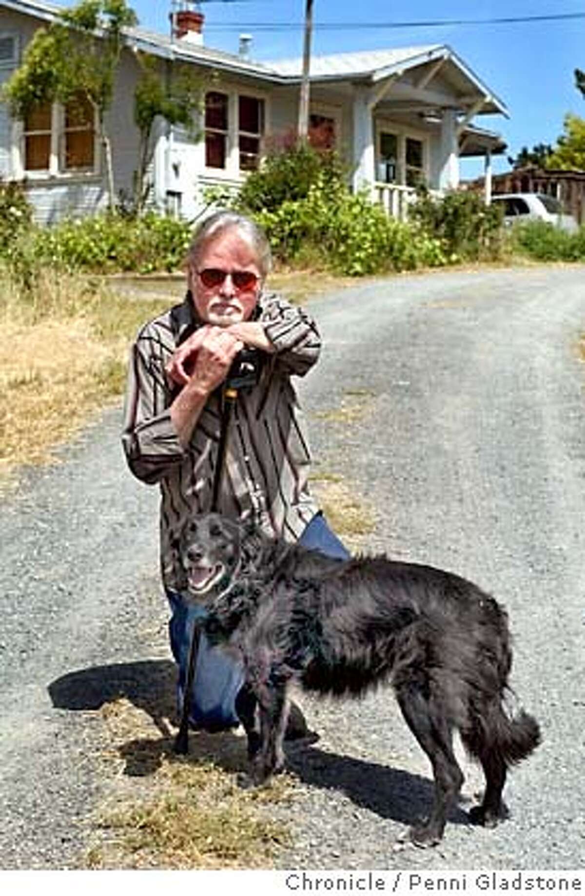 Dryden in front of his home with his landlords dog which he cares for during the day. Jefferson Airplane drummer Spencer Dryden has fallen on hard times. His health is failing. He doesn't have any dough and his house burned down with all his earthly possessions. A benefit is being held on his belaf 5-22 at Slim's on 5/13/04 in Penngrove, CA. must credit photo by Penni Gladstone/