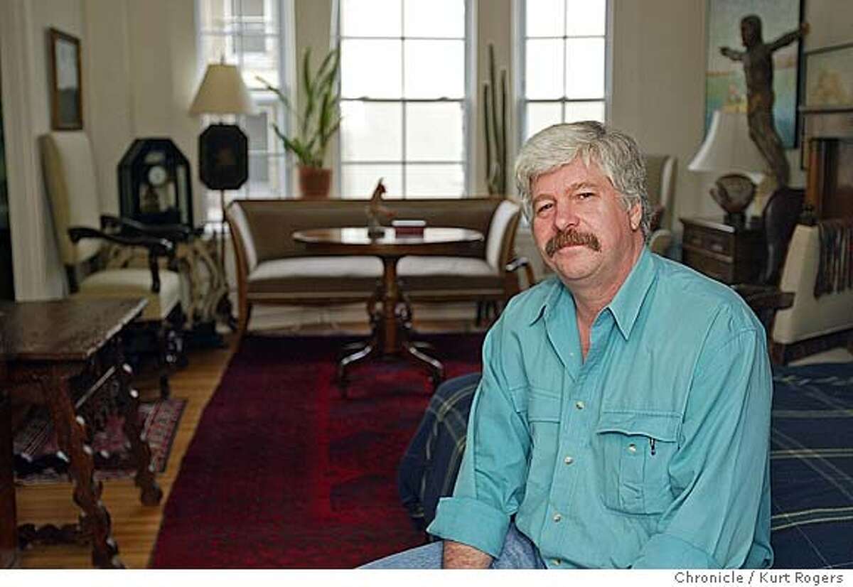 Rick Hill, an antiques collector who has his 600-square-foot studio apartment packed with antiques. 7/13/05 in San Francisco,CA. Kurt Rogers/The Chronicle