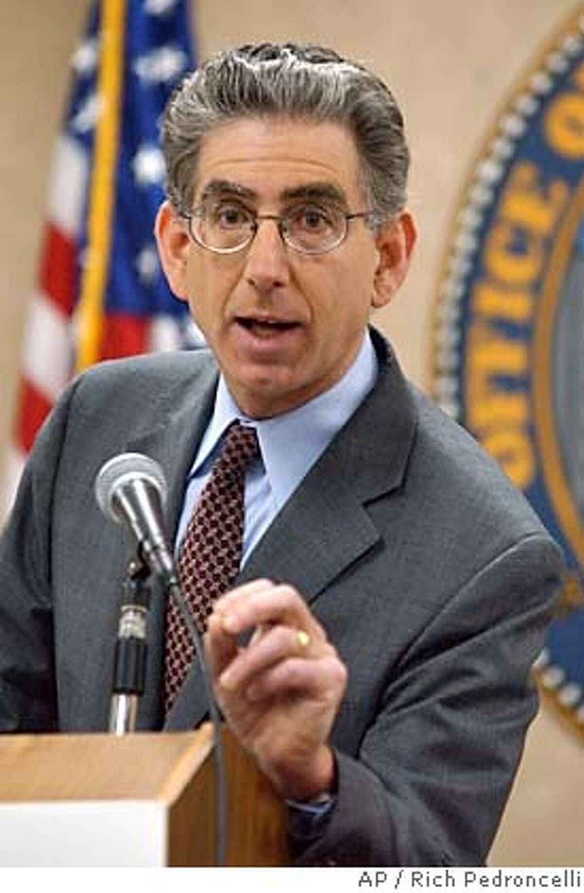 Treasuer Phil Angelides gestures as he discusses his backup plan to keep the state solvent if voters reject a $15 billion bond measure, during a news conference held in Sacramento, Calif., Thursday, Feb. 19, 2004. Worried that voters might turn down Gov. Arnold Schwarzenegger's Proposition 57 on the March ballot, Angelides unveiled his contingency plan that would raise income taxes on the highest-earning Californians and take out short-term loans from wall street investors.(AP Photo/Rich Pedroncelli) ALSO RAN: 03/22/2004 Treasurer Phil Angelides says a backup plan is needed if a $15 billion bond measure fails. ProductNameChronicle ProductNameChronicle Ran on: 11-10-2004 State Treasurer Phil Angelides says four firms overpay their executives. Ran on: 12-01-2004 Harrigan Ran on: 12-07-2004 Treasurer Phil Angelides, shown here in February, praised a recent partnership that lets Silicon Valley business leaders advise small to medium businesses. #######0421629071