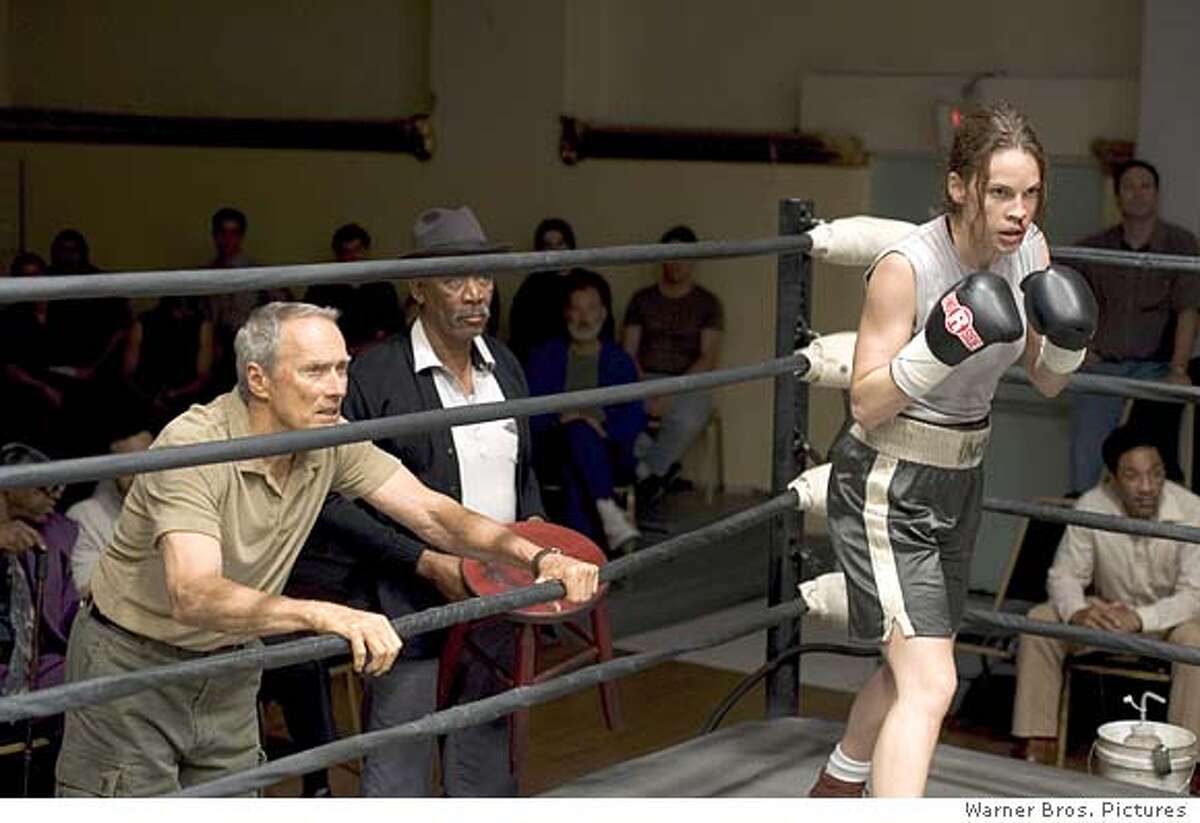 milliondollarbaby CLINT EASTWOOD as Frankie, MORGAN FREEMAN as Scrap and HILARY SWANK as Maggie in Warner Bros. Pictures� drama �Million Dollar Baby�, a Malpaso production. PHOTOGRAPHS TO BE USED SOLELY FOR ADVERTISING, PROMOTION, PUBLICITY OR REVIEWS OF THIS SPECIFIC MOTION PICTURE AND TO REMAIN THE PROPERTY OF THE STUDIO. NOT FOR SALE OR REDISTRIBUTION. Ran on: 12-25-2004 Frankie (Clint Eastwood) and Eddie (Morgan Freeman, center) watch Maggie (Hilary Swank) in the ring. Swank received a Golden Globe nomination for portraying Maggie, who wants to become a pro boxer. Ran on: 01-02-2005 Clint Eastwood, Morgan Freeman and Hilary Swank in Million Dollar Baby. Ran on: 01-02-2005 Clint Eastwood, Morgan Freeman and Hilary Swank in Million Dollar Baby.