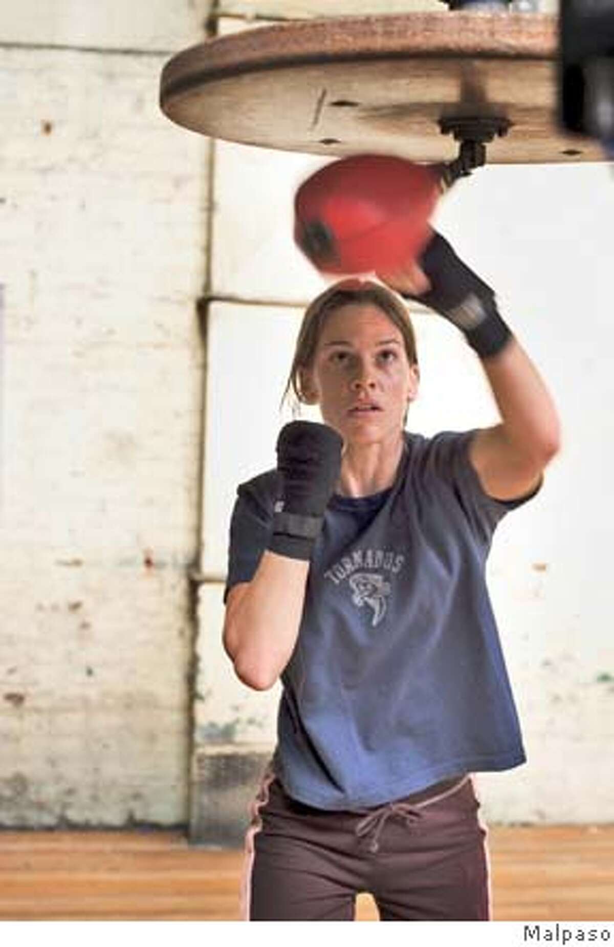 milliondollarbaby HILARY SWANK as Maggie in Warner Bros. Pictures� drama �Million Dollar Baby.� The Malpaso production also stars Clint Eastwood and Morgan Freeman. PHOTOGRAPHS TO BE USED SOLELY FOR ADVERTISING
