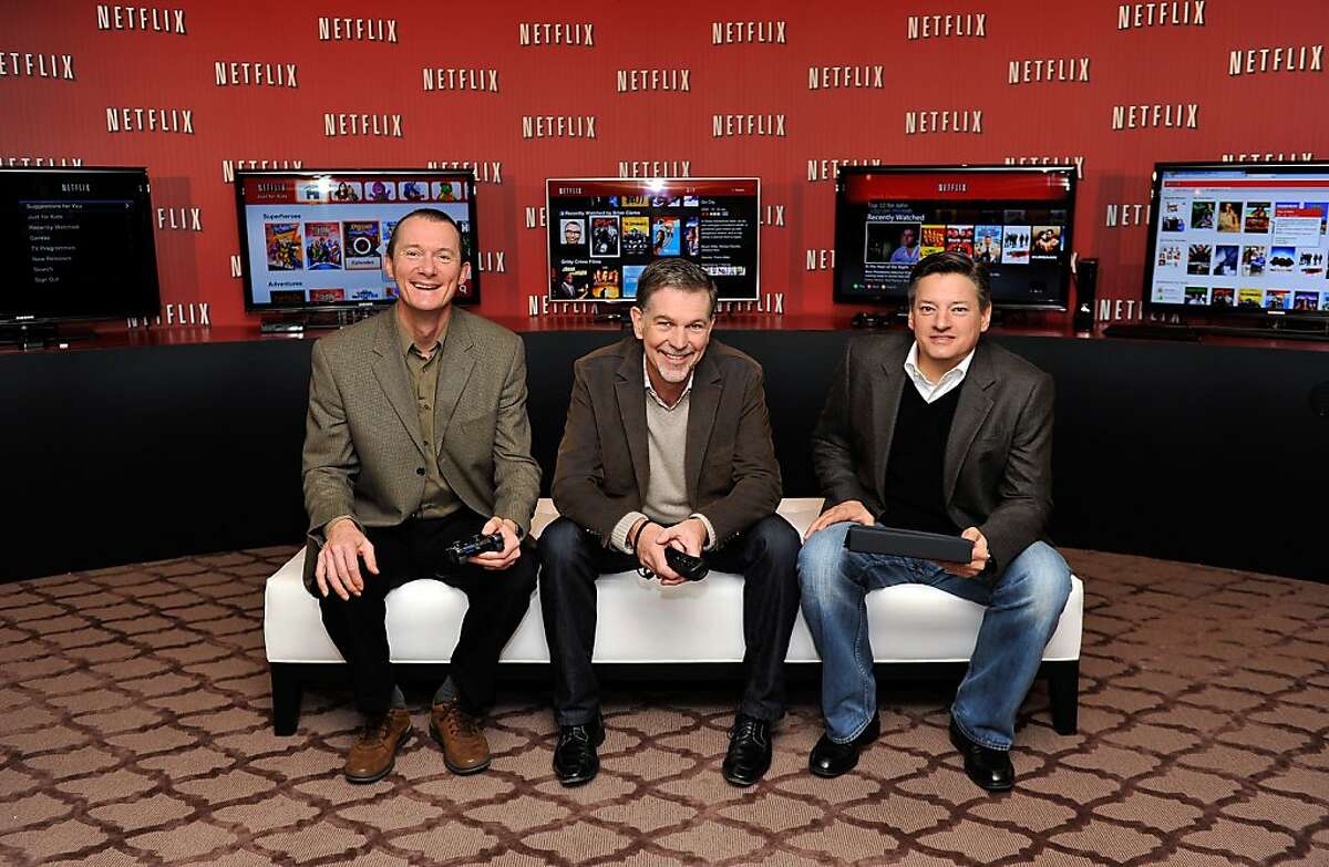 LONDON, ENGLAND - JANUARY 09: (L-R) Neil Hunt, Chief Product Officer Netflix, Reed Hastings Co-Founder and CEO Netflix, Ted Sarandos, Chief Content Officer Netflix pose during the Netflix UK launch in London, England on January 9, 2012. Netflix the leading global internet subscription service for films and TV programmes, launches today in the United Kingdom and Ireland, offering instant and unlimited access to a broad range of entertainment for the low monthly price of £5.99 in the UK and €6.99 in Ireland. (Photo by Gareth Cattermole/Getty Images for Netflix)