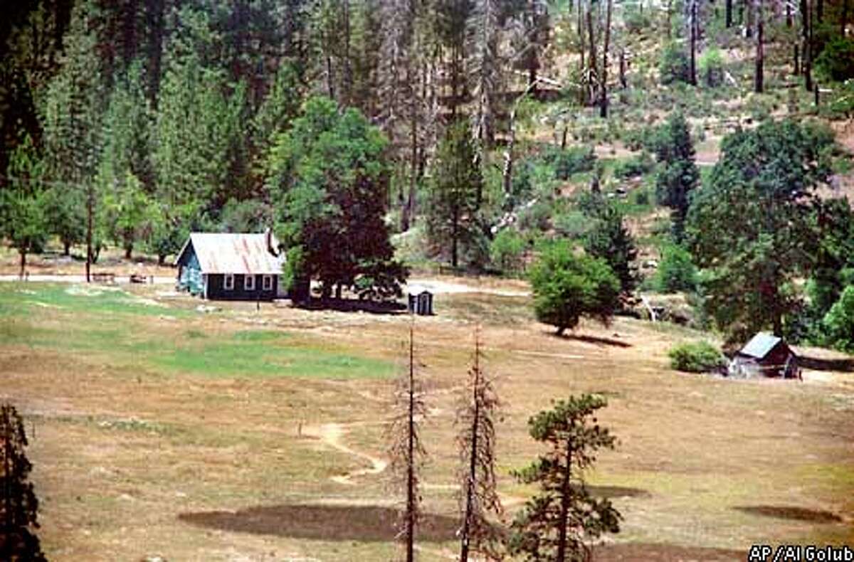 In July 1999, Cary Stayner happened upon Joie Ruth Armstrong outside this cabin in Yosemite National Park. Stayner talked to her about Bigfoot, which he claimed to have seen in the area years before. He later said he was unable to resist killing her when he realized she was alone. Her decapitated body was found Thursday, July 22, 1999 near Crane Creek which runs behind the house. (AP Photo/The Modesto Bee, Al Golub)