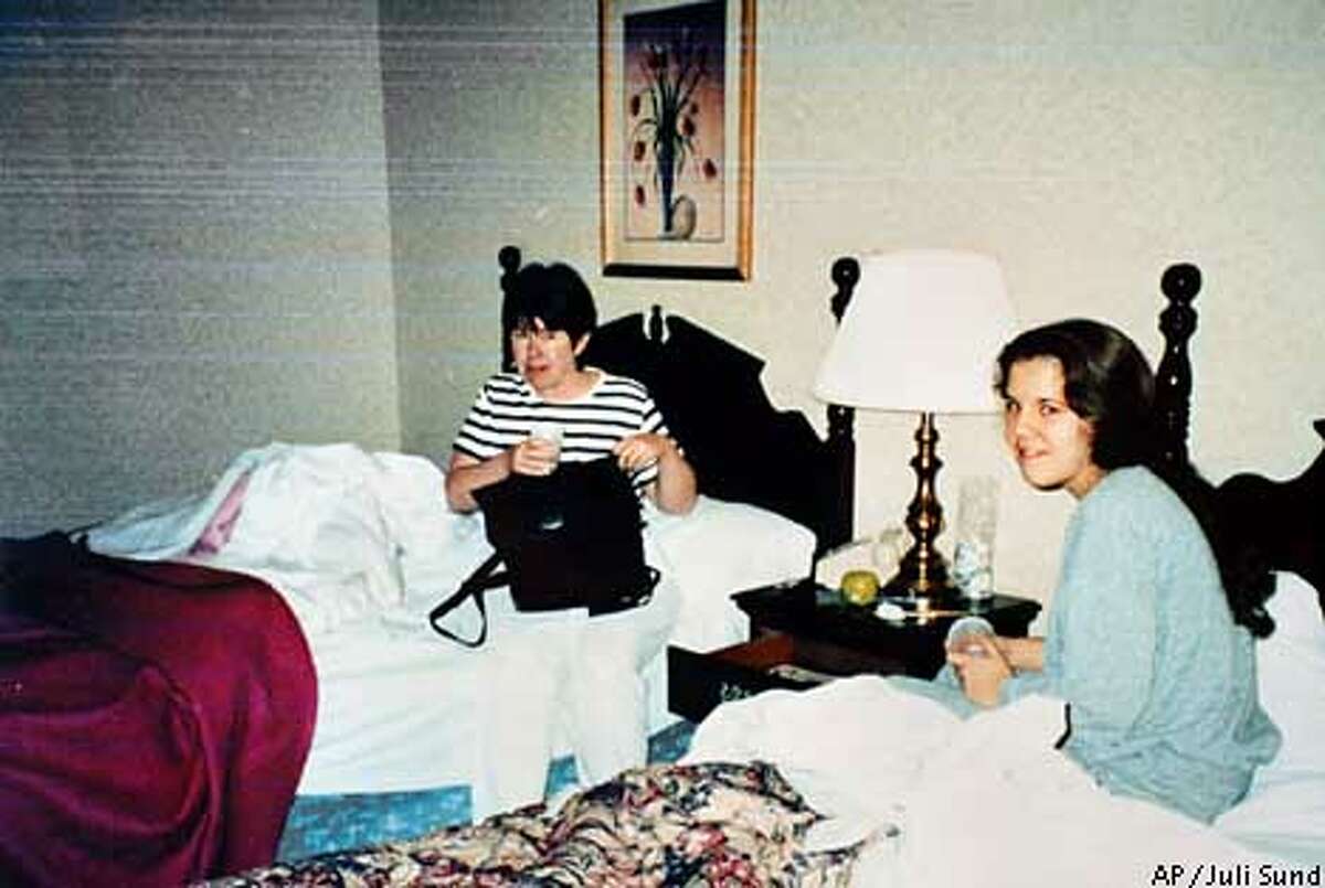 In a photograph taken by Juli Sund and released by Francis Carrington, Carole Sund (left) is shown with Silvina Pelosso in their room at the Cedar Lodge in El Portal shortly before they were killed in February 1999. The photographs were released by family members before a jury began deliberations in the murder trial of Cary Stayner. (AP Photo/Juli Sund, Carrington family)