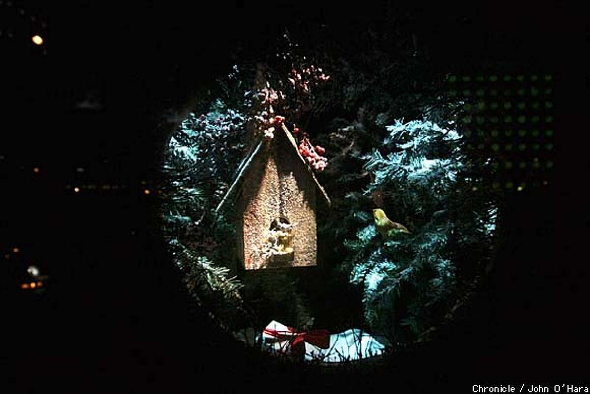 Window on the holidays / Streetside store displays can soothe seasonal ...