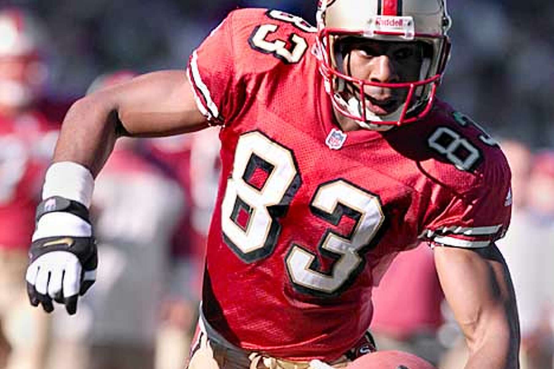 JJ Stokes of the San Francisco 49errs walks off the field during