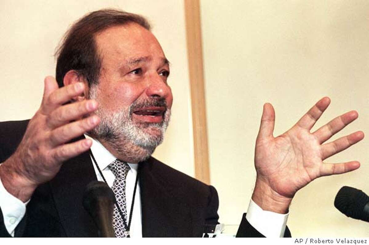 FILE--Carlos Slim Helu is seen in this file picture during an interview on in Mexico City. Slim Helu, by some accounts the richest man in Latin America, has been spending a lot of his time lately in a tiny Dallas courtroom, where he is on trial in a case that's either about greed and betrayal or about business incompetence. It depends on who you believe. (AP Photo/Roberto Velazquez)
