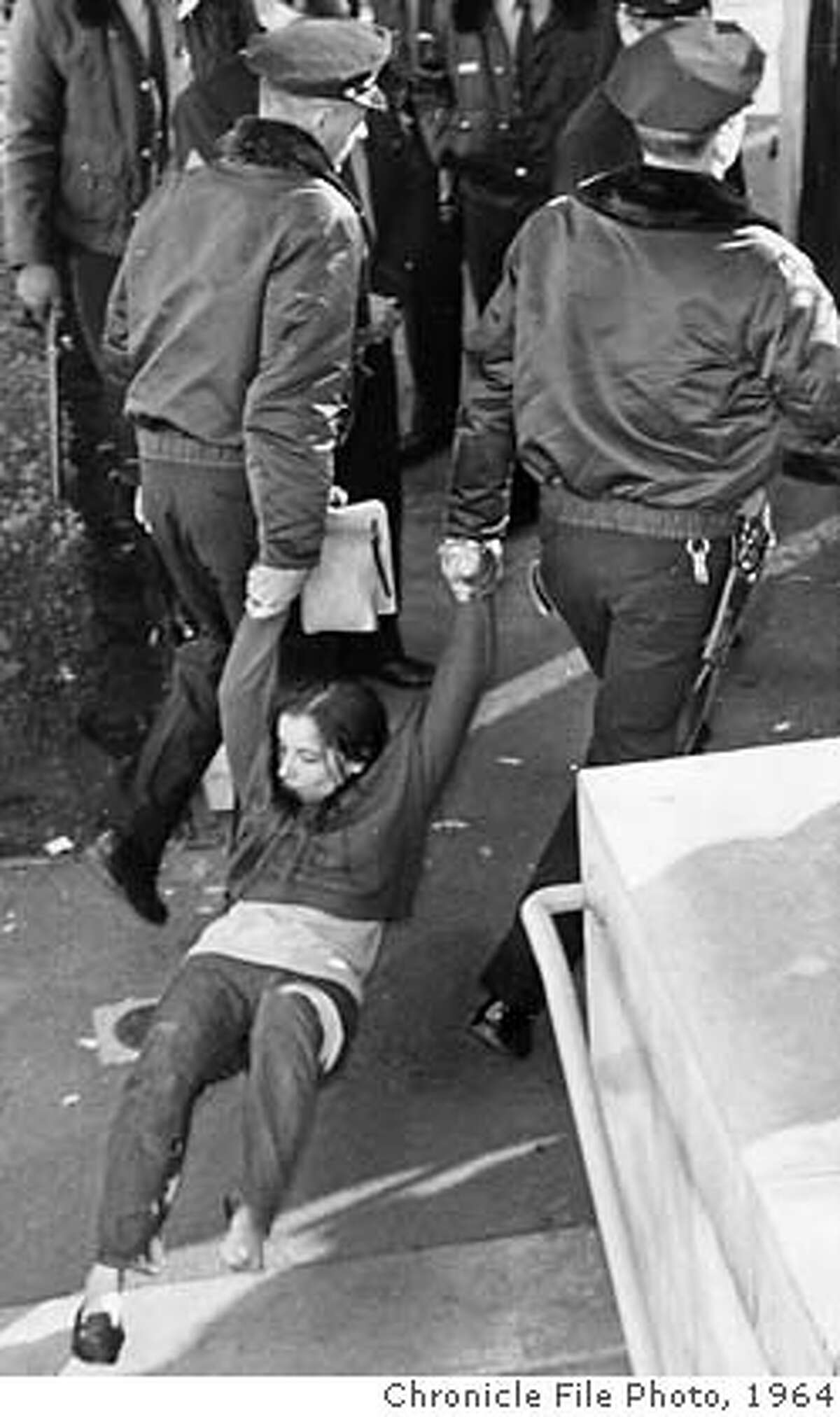 Police arrest protester at UC Berkeley, December 1964. Chronicle File Photo, 1964