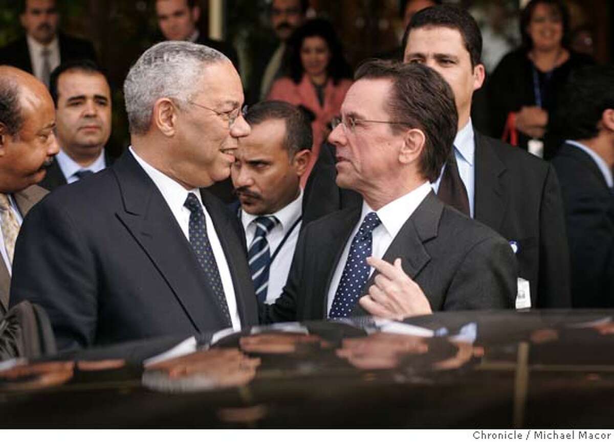 US Ambassador Thomas Riley escorts Secretary Powell throughout his visit to Morocco. US Secretary of State Colin Powell at the "Forum for the Future" in Rabat, Morrocco, where he is co-chairman of the event. Government officials from across the broader Middle East and North Africa and from the Group of Eight industrial nations (G8) began meetings in Rabat, Morocco, today, to discuss initiatives aimed at supporting efforts to achieve greater political participation and economic development in the countries of the region. 12/11/04 Rabat, Morocco Michael Macor / San Francisco Chronicle