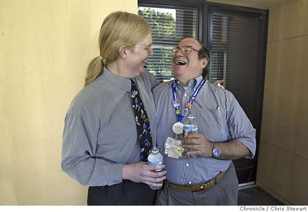 transgenderdoc143.jpg Event on 3/15/05 in Walnut Creek. Dr. Judson Lively shares a laugh with Dr. David Niver at the Shadelands Art Center in Walnut Creek where Lively, Kaiser�s top doctor for Contra Costa and parts of Alameda County, told her staff Tuesday to call her by a new name: Judy. The 48-year-old surgeon and administrator has known since fourth grade that she was a girl trapped in a boy�s body. Lively will finally put aside the stereotypical male persona she has worked to create over the years � Army surgeon, skydiver, martial arts expert � and be her real self. She has been taking hormones for three years (but bound her breasts for work), grown her hair and nails and has been living as a woman outside of work, with the support of her wife and adult daughter. After Tuesday�s announcement and another meeting, Lively will take 10 days off, legally change her name, and return to her job wearing scarves instead of ties. She plans to continue seeing patients once her medical license and prescription pads catch up with her new name and gender. An inside look at how someone with a very public identity as a man tells the world that she identifies as a woman. Chris Stewart / The Chronicle MANDATORY CREDIT FOR PHOTOG AND SF CHRONICLE/ -MAGS OUT