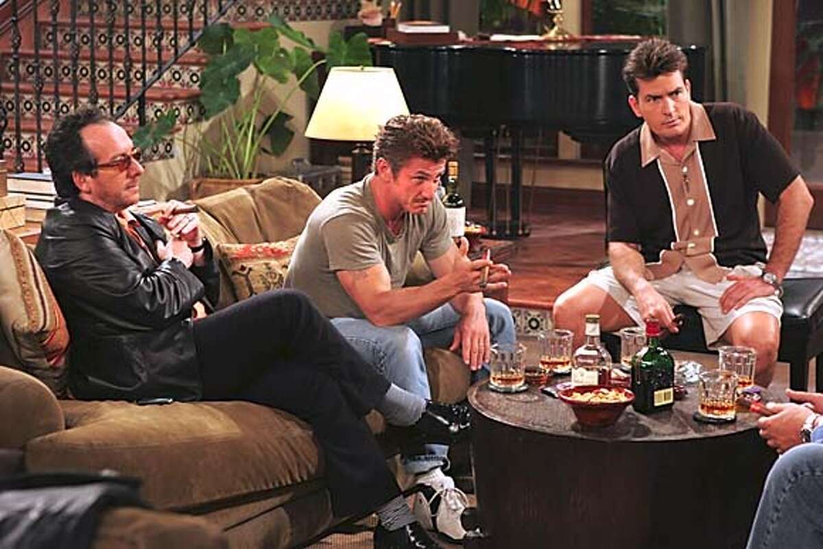 GOODMAN20 "Back Off Mary Poppins" -- Charlie Sheen (left) with guest starts, (left to right) Elvis Costello and Sean Penn on TWO AND A HALF MEN Mondays, (9:30-10:00 PM, ET/PT) on the CBS Television Network.. Photo: �2004 Warner Brothers Television Inc. MANDATORY CREDIT; ; NO ARCHIVE; NORTH AMERICAN USE ONLY