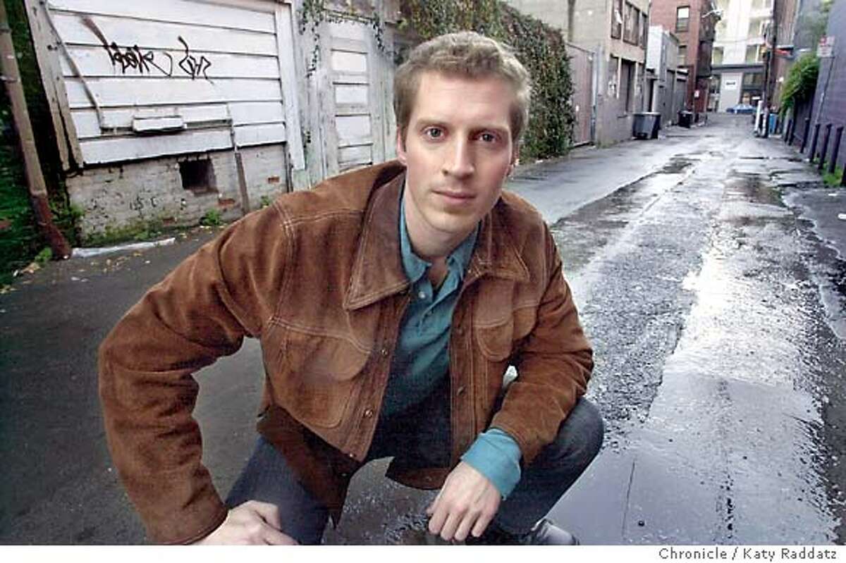 Andrew Sean Greer is a brilliant new author based in San Francisco. His novel, "The Confessions of Max Tivoli" just won a rave review from John Updike in the New Yorker. SHOWN: Greer in a South Park alley, where the hero of his novel is raised. Shoot date is 1/27/04; writer is Edward Guthmann. Katy Raddatz / The Chronicle