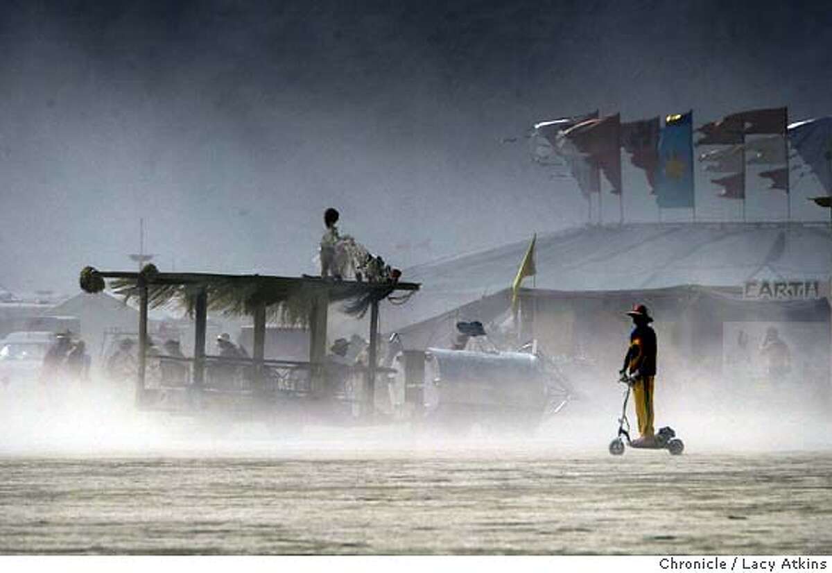 Dust swipps through the Black Rock Desert, Thursday Sept. 2, 2004 at the Burning Man Celebration.People continue to gather at Black Rock desert for the 18th annual Burning Man celebration. LACY ATKINS/ The Chronicle